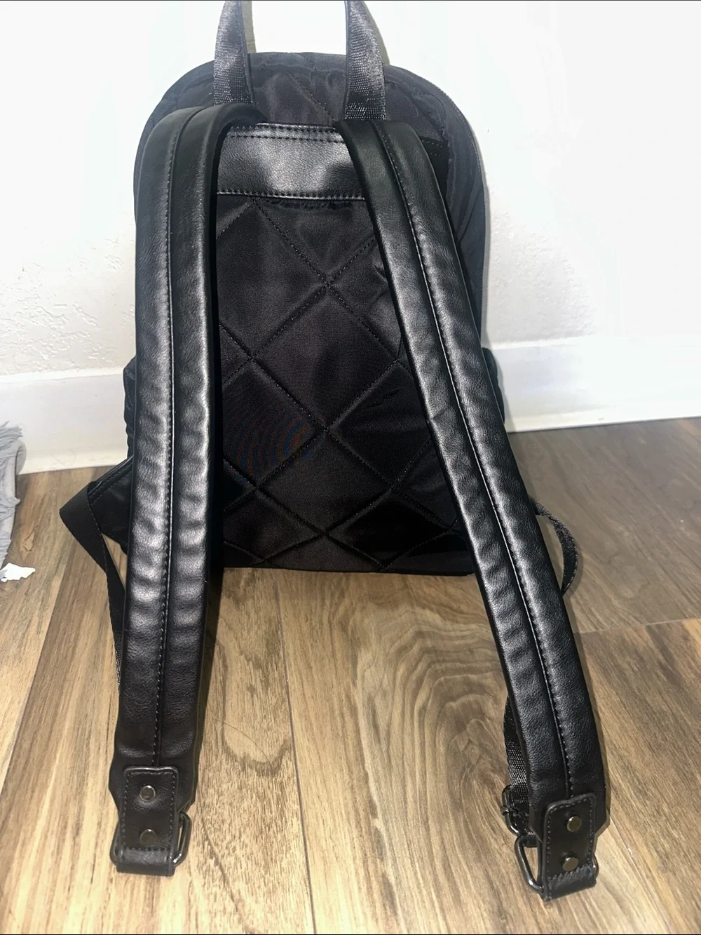 Peloton Black Quilted Men's Backpack with Front Zip Pocket